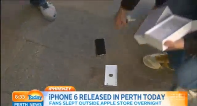 That sucks! Person to buy the 1st iPhone 6 in Perth, Australia drops it on live TV.